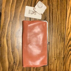 NWT pink HOBO clutch.